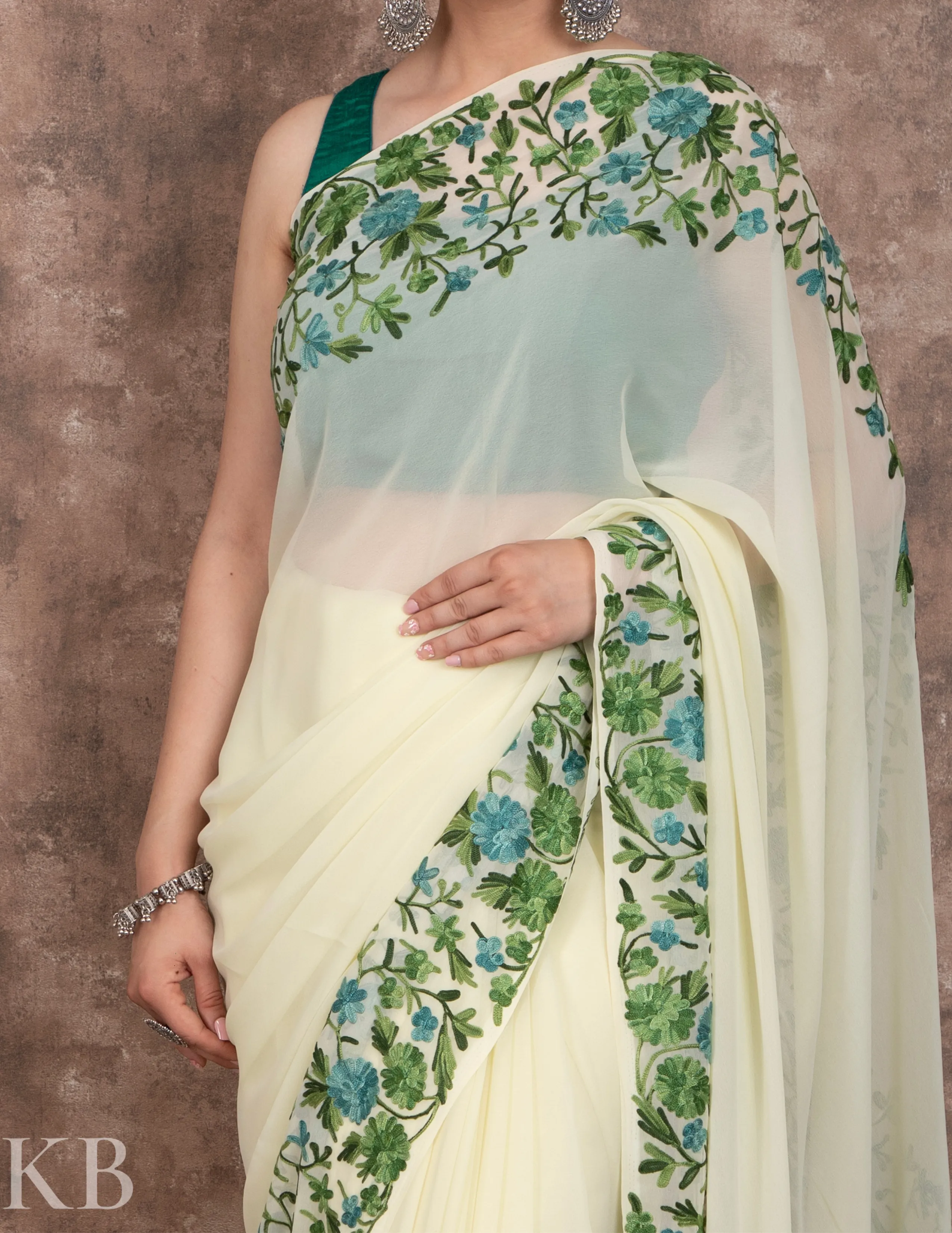 Lemon Yellow Flowery Vine Aari Georgette Saree